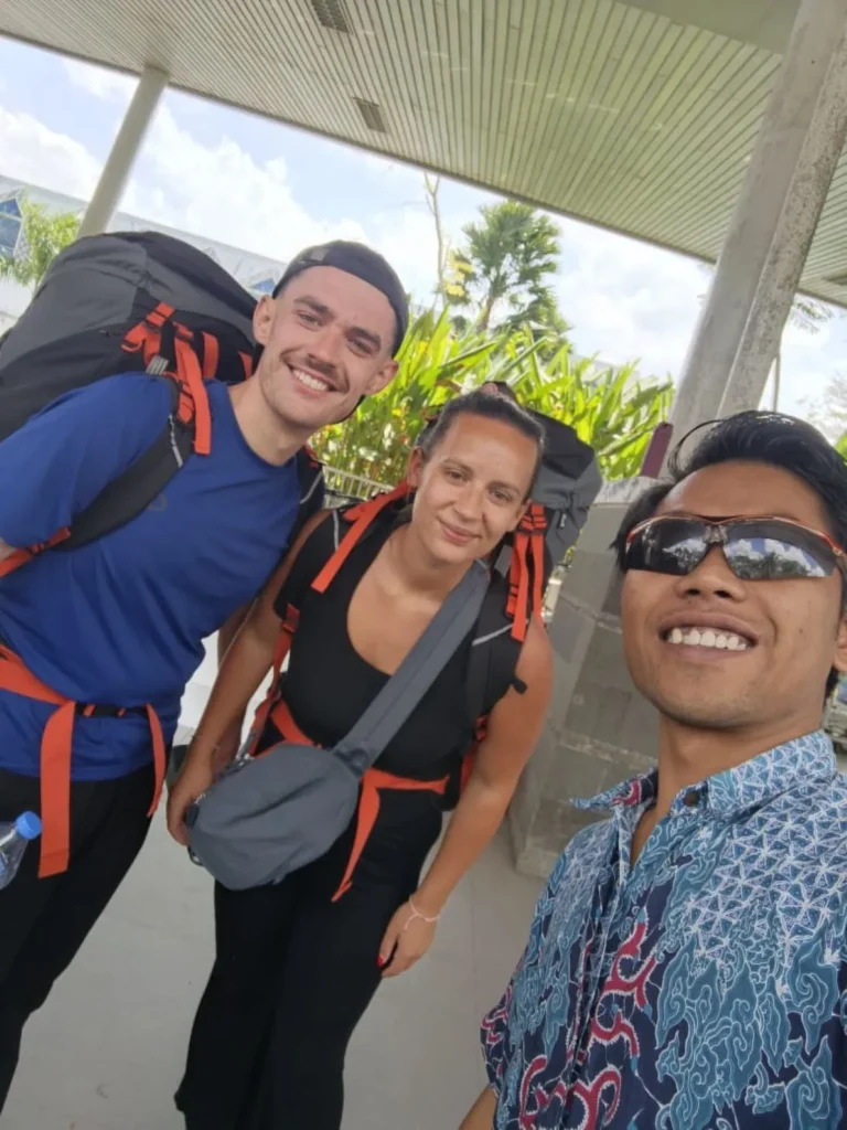 Happy customers after taxi ride from Kuta to Praya Airport in Lombok